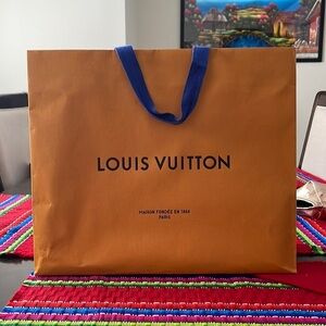 Louis Vuitton shopping bag empty